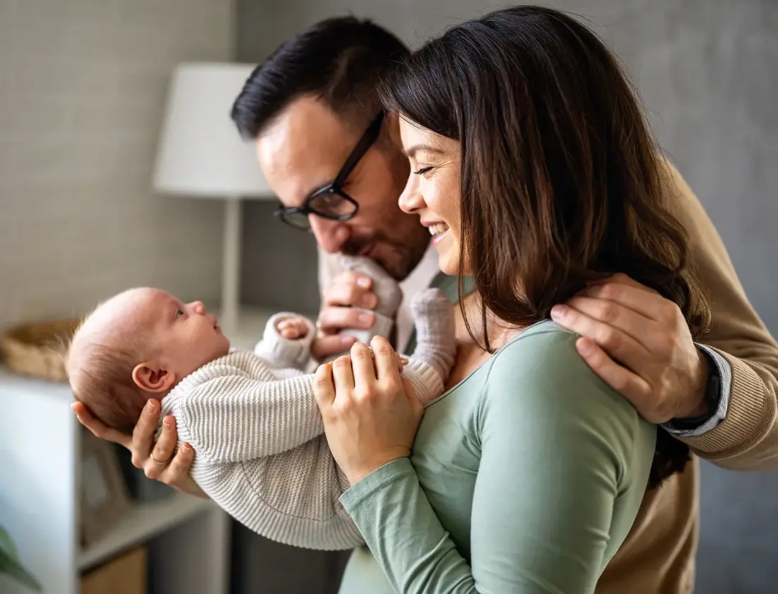 Parents with their newborn baby